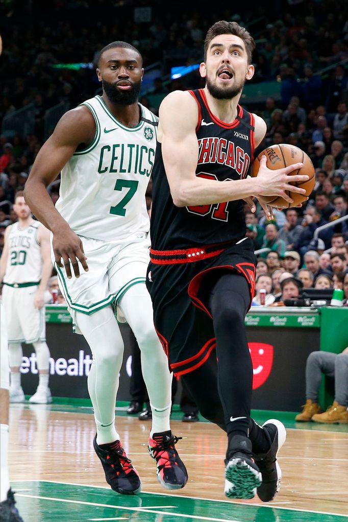 Jan 13, 2020; Boston, Massachusetts, USA; Chicago Bulls guard Tomáš Satoranský (31) drives past Boston Celtics guard Jaylen Brown (7) during the first half at TD Garden.