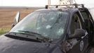 The tornadic storm observed earlier was accompanied by large dangerous hail which smashed the windshield of this National Severe Storms Laboratory instrumented vehicle. Note leaves and mud on side of truck. Wyoming, LaGrange. June 5, 2009. Credit: VORTEX II.