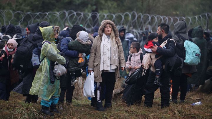 Merkelová mluvila s Putinem o migrantech u polských hranic. Vyzvala ho, aby konal; Zdroj foto: Reuters