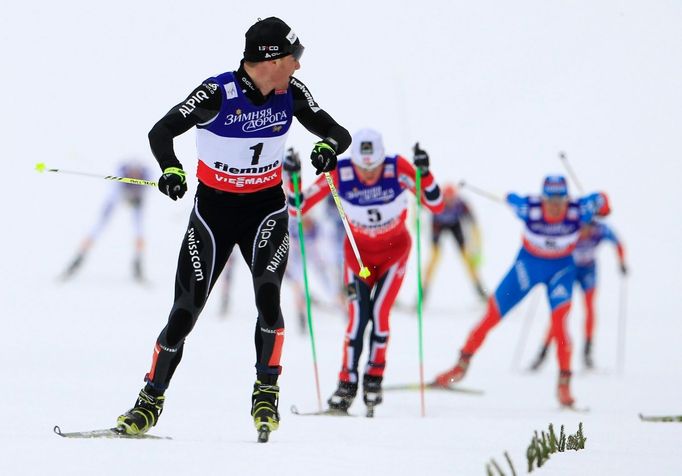 MS v klasickém lyžování 2013, skiatlon mužů: Dario Cologna (v černém) finišuje