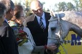 The Princess meets the winner of The Velká Pardubická Steeplechase, a seven-year-old white mare Sixteen. The Agriculture Minister Petr Gandalovič looks reasonably happy.