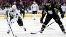 Jan 25, 2015; Columbus, OH, USA; Team Toews center Jonathan Toews (19) of the Chicago Blackhawks controls the puck against Team Foligno defenseman Brent Burns (88) of the