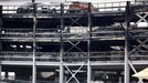 A view shows burnt vehicles in Terminal Car Park 2, following a fire at London Luton Airport, in Luton, Britain, October 11, 2023.  REUTERS/Peter Cziborra