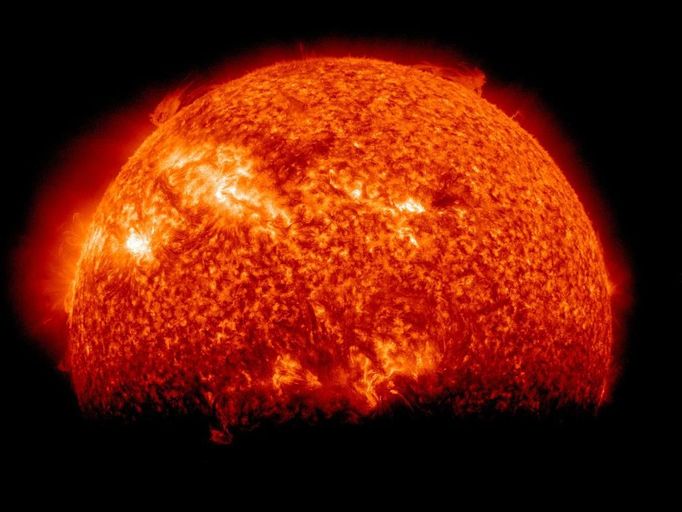 SDO Sees Spring Eclipse Not exactly a solar event: Twice a year, SDO enters an eclipse season where the spacecraft slips behind Earth for up to 72 minutes a day. Unlike the crisp shadow one sees on the sun during a lunar eclipse, Earth's shadow has a variegated edge due to its atmosphere, which blocks the sun light to different degrees depending on its density. Also, light from brighter spots on the sun may make it through, which is why some solar features extend low into Earth's shadow. Credit: NASA/GSFC/SDO