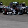 Mercedes Formula One driver Rosberg of Germany cuts inside Mercedes Formula One driver Hamilton of Britain on the start during the Canadian F1 Grand Prix at the Circuit Gilles Villeneuve in Montreal