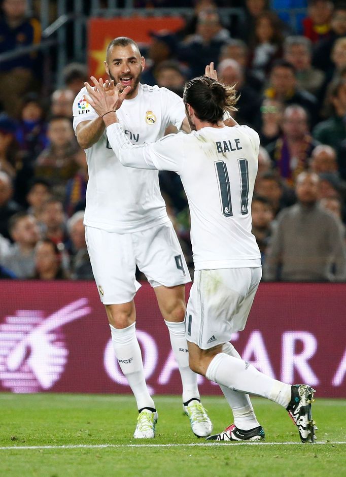 Real Madrid's Karim Benzema celebrates scoring their first goal with Gareth Bale