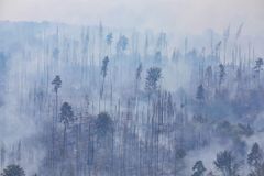 Oheň v národním parku děsí, protože spaluje touhu po časech, které mizí v nenávratnu