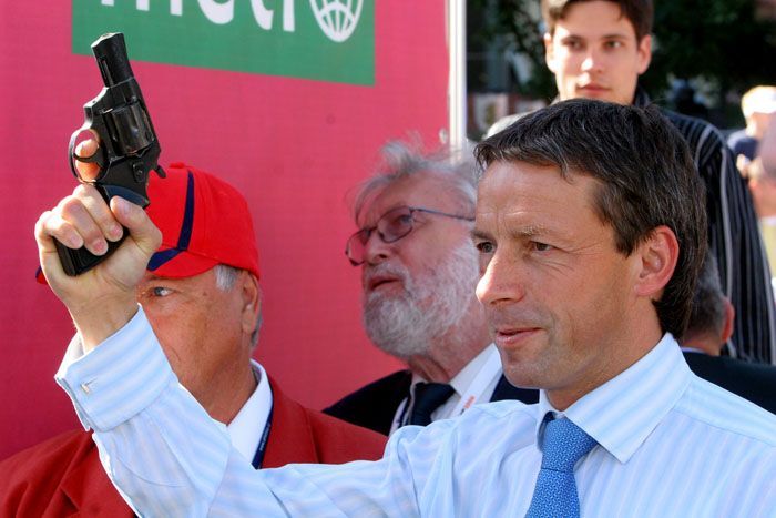 Běžci a běžkyně v ulicích Prahy