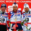 Bauer of the Czech Republic, Norway's Northug and Sweden's Olsson pose after the men's cross country 50 km mass start classic race at the Nordic World Ski Championships in Falun