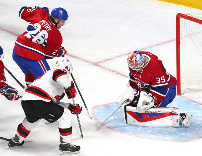 NHL, New Jersey - Montreal: Jiří Tlustý (9) - Jeff Petry (26) a Mike Condon (39)