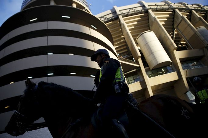 A mounted Spanish National Police officer patrols outside the Santiago Bernabeu stadium before the &quot;Clasico&quot; soccer match between Real Madrid and Barcelona in M