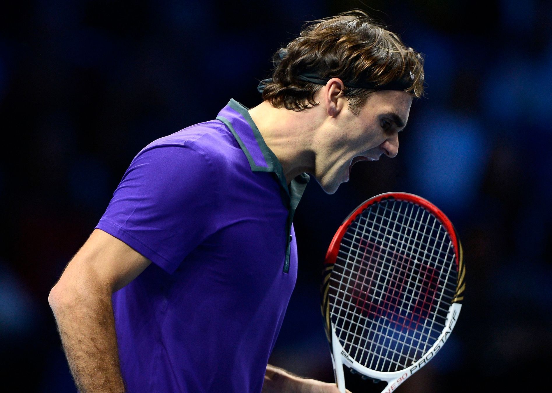 Roger Federer slaví výhru v zápase Turnaje mistrů