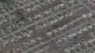 An aerial view of damage to neighborhoods in Moore, Oklahoma May 21, 2013, is seen in the aftermath of a tornado which ravaged the suburb of Oklahoma City. Rescuers went building to building in search of victims and survivors picked through the rubble of their shattered homes on Tuesday, a day after a massive tornado tore through the Oklahoma City suburb of Moore, wiping out blocks of houses and killing at least 24 people. REUTERS/Rick Wilking (UNITED STATES - Tags: DISASTER ENVIRONMENT) Published: Kvě. 22, 2013, 2:57 dop.