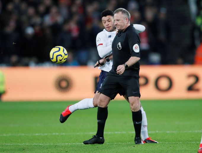 Soccer Football - Premier League - West Ham United v Liverpool - London Stadium, London, Britain - January 29, 2020   Liverpool's Alex Oxlade-Chamberlain and referee Jona