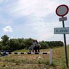 Běženci po přechodu srbsko-maďarské hranice u města Asotthalom