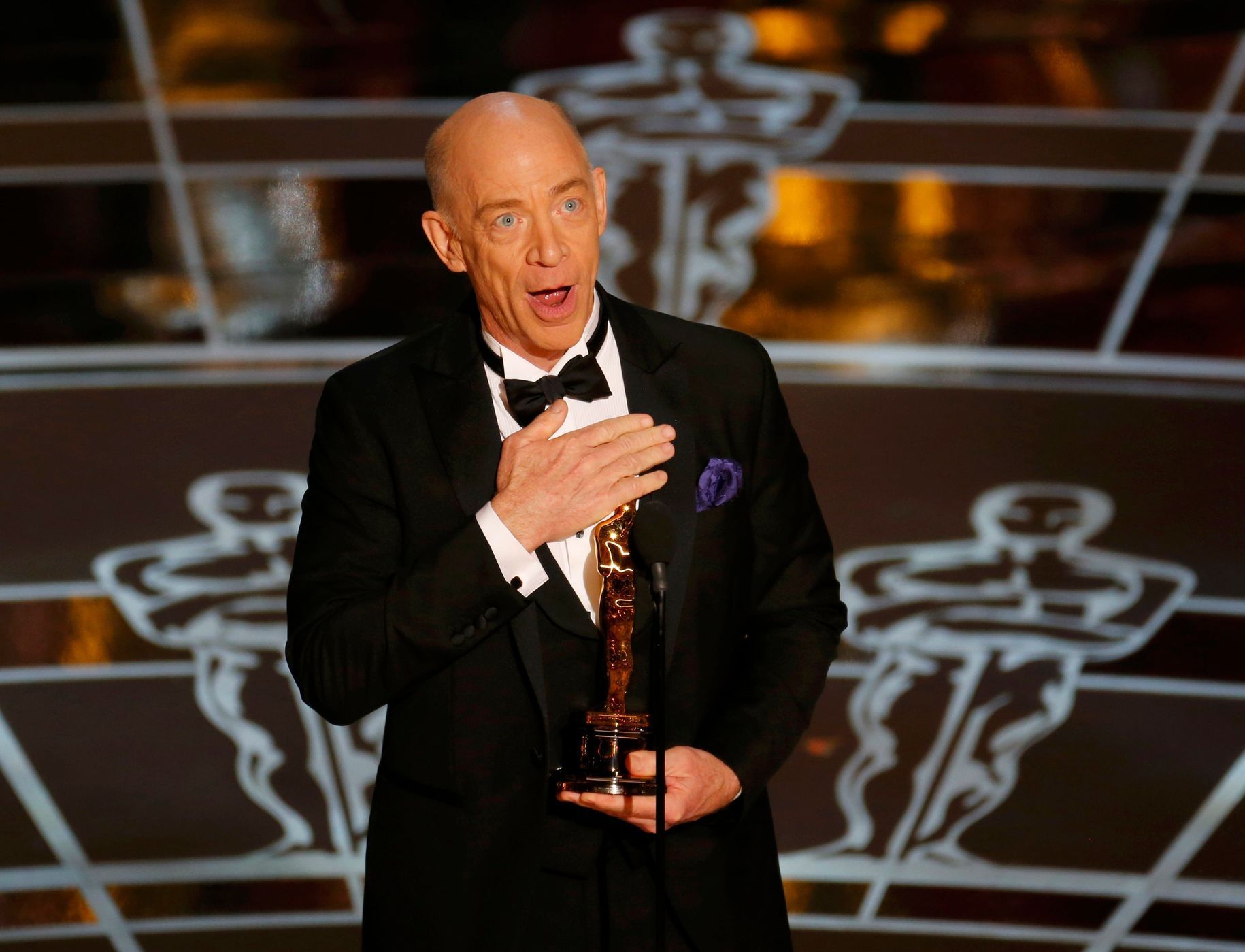 J.K. Simmons receives the Oscar for actor in a supporting role for &quot;Whiplash&quot; at the 87th Academy Awards in Hollywood, California