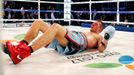 Martin Murray of England after being knocked down by World champion Gennadiy Golovkin of Kazakhstan during their WBA-WBC-IBO Middleweight World Championship fight in Mont