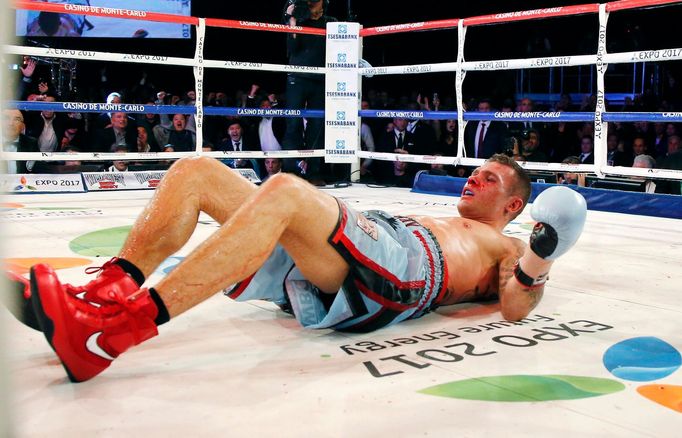 Martin Murray of England after being knocked down by World champion Gennadiy Golovkin of Kazakhstan during their WBA-WBC-IBO Middleweight World Championship fight in Mont