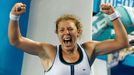 Germany's Anna-Lena Friedsam celebrates after winning her third round match against Italy's Roberta Vinci at the Australian Open tennis tournament at Melbourne Park, Aust