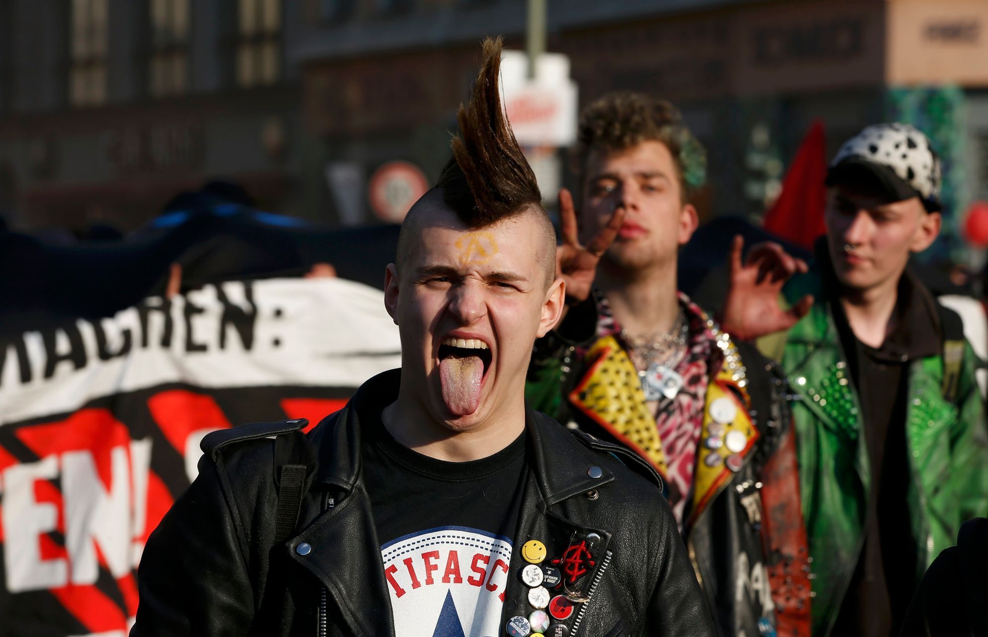 People walk through the streets at the traditional MyFest street festival in Berlin's Kreuzberg district