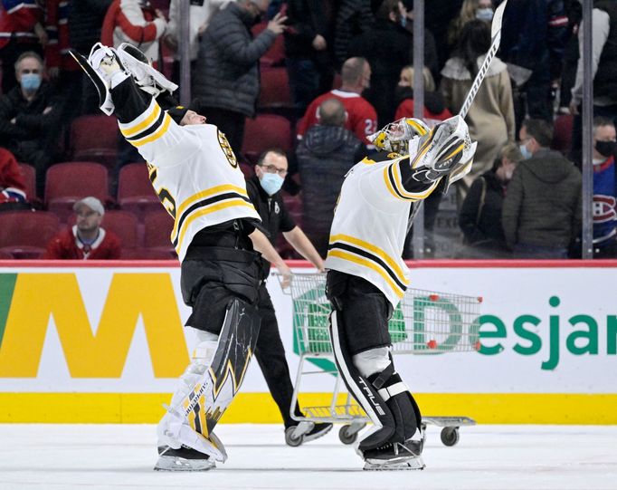 Mar 21, 2022; Montreal, Quebec, CAN; Boston Bruins goaltenders Linus Ullmark (35) and Jeremy Swayman (1) celebrate the victory over the Montreal Canadiens in overtime at