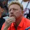 Becker watches as Djokovic of Serbia plays Cilic of Croatia during their men's singles semi-final match at the U.S. Open Championships tennis tournament in New York