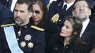 Spain's Prince Felipe (L) and Princess Letizia and Spain's Prime Minister Mariano Rajoy (R) attend the inaugural mass of Pope Francis at the Vatican, March 19, 2013. Pope Francis celebrates his inaugural mass on Tuesday among political and religious leaders from around the world and amid a wave of hope for a renewal of the scandal-plagued Roman Catholic Church. REUTERS/Paul Hanna (VATICAN - Tags: RELIGION POLITICS ROYALS ENTERTAINMENT) Published: Bře. 19, 2013, 10:17 dop.