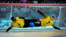 Paris 2024 Paralympics - Goalball - Men's Bronze Medal Game - South Paris Arena 6, Paris, France - September 5, 2024. Yu Qinquan and Yu Deyi of China in action against Br