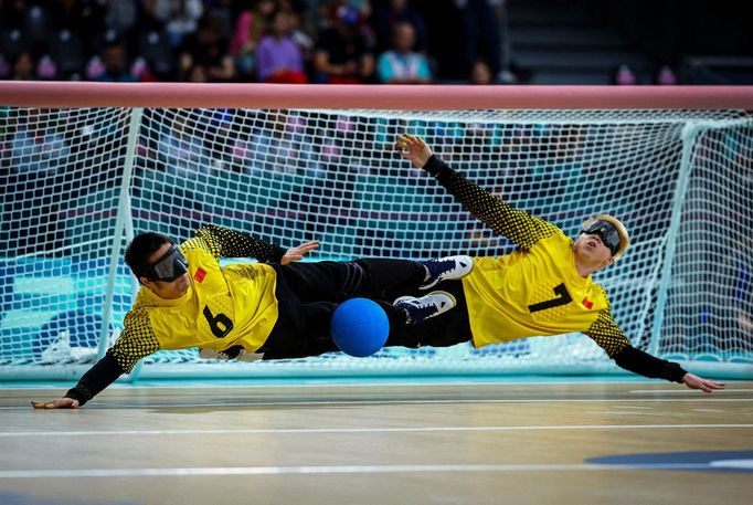 Paris 2024 Paralympics - Goalball - Men's Bronze Medal Game - South Paris Arena 6, Paris, France - September 5, 2024. Yu Qinquan and Yu Deyi of China in action against Br