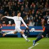 Real Madrid's Cristiano Ronaldo challenges Paris Saint Germain's Maxwell and Marco Verratti during their Champions League Group A soccer match at the Parc des Princes stadium in Paris