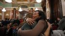 Mercedes Santos (R) hugs her partner Theresa Volpe as they celebrate a vote by the Senate Executive committee hearing on same-sex marriages at the Illinois State Legislature in Springfield, Illinois, January 3, 2013. The Committee voted 8-5 to send the bill to a full vote in the Senate. Picture taken January 3, 2013. REUTERS/Jim Young (UNITED STATES - Tags: SOCIETY) Published: Bře. 25, 2013, 6:06 odp.