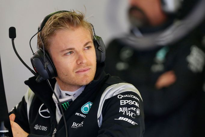 Mercedes F1 driver Nico Rosberg sits in the team garage after crashing out of the second practice session at the Australian Formula One Grand Prix in Melbourne. REUTERS/B