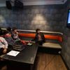 Sung Min See and his friends sing in a karaoke cafe in the Koreatown area of Los Angeles
