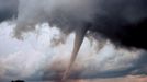 Project Vortex-99. Occluded mesocyclone tornado. Occluded means old circulation on a storm; this tornado was forming while the new circulation was beginning to form the tornadoes which preceeded the F5 Oklahoma City tornado. Photo #3 of sequence. Oklahoma 7 miles south of Anadarko. May 3, 1999. Credit: OAR/ERL/National Severe Storms Laboratory (NSSL).