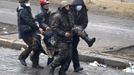 ATTENTION EDITORS - VISUAL COVERAGE OF SCENES OF INJURY OR DEATH - Anti-government protesters carry an injured man on a stretcher in Independence Square in Kiev February