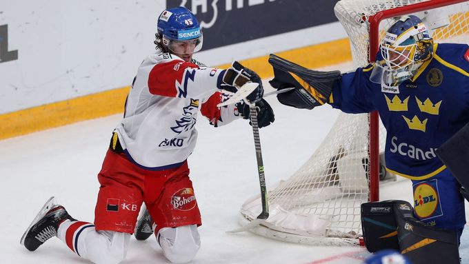 Ice Hockey - Euro Hockey Tour - Channel One Cup - Czech Republic v Sweden - CSKA Arena, Moscow, Russia - December 19, 2021  Czech Republic's Lukas Sedlak with Sweden's Ma