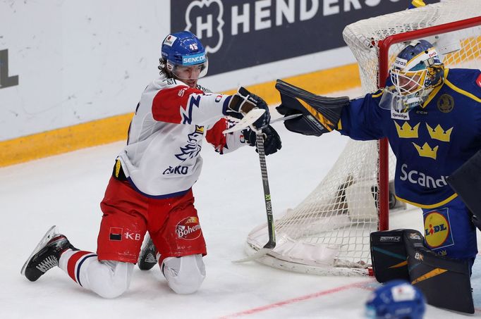 Ice Hockey - Euro Hockey Tour - Channel One Cup - Czech Republic v Sweden - CSKA Arena, Moscow, Russia - December 19, 2021  Czech Republic's Lukas Sedlak with Sweden's Ma