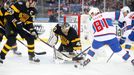 Boston Bruins goalie Tuukka Rask (40) and Boston Bruins defenseman Zdeno Chara (33) block a shot by Montreal Canadiens center Lars Eller (81)