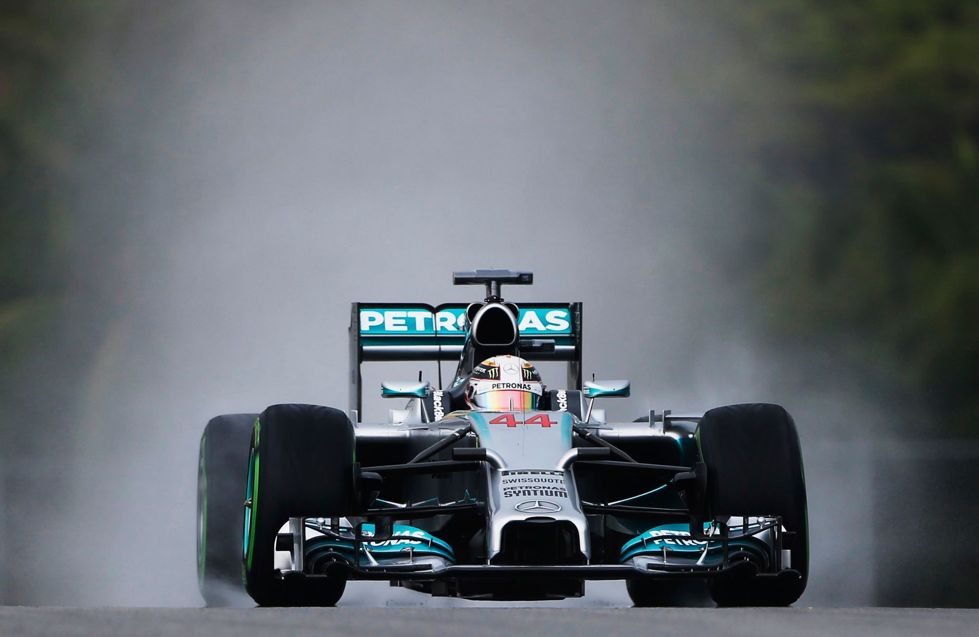 Mercedes Formula One driver Hamilton of Britain drives during the qualifying session for the Malaysian F1 Grand Prix at Sepang International Circuit outside Kuala Lumpur