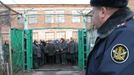 In this photo taken Nov. 30, 2011, imprisoned women wait to be escorted for work at a women's prison outside the city of Orel, central Russia. Two members of the punk band Pussy Riot will serve their sentence in a penal colony far from Moscow that is like what a former inmate describes as a "nasty Girl Scout camp.? Although Russia?s prison system is a far cry from Stalin?s gulag, the principle remains the same: to isolate people from their families and wear them down through ?corrective labor,? which for women usually means hunching over a sewing machine. Maria Alyokhina and Nadezhda Tolokonnikova will have to quickly learn the inner laws of prison life, survive the dire food and medical care, and risk reprisal from inmates either offended by their "punk prayer" against President Vladimir Putin or ordered to pressure them by higher authorities. (AP Photo/Yuri Tutov)