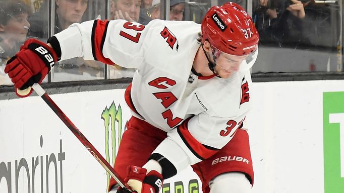 Apr 9, 2024; Boston, Massachusetts, USA; Carolina Hurricanes right wing Andrei Svechnikov (37) flips the puck on the blade of his stick prior to scoring a goal during the