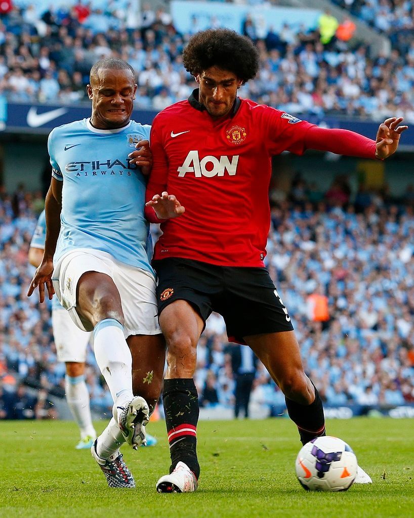 Manchester City vs. United, utkání Premier League (Kompany, Fellaini)