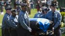 Massachusetts Institute of Technology Police pallbearers carry the casket of Patrol Officer Sean Collier during a memorial service at MIT in Cambridge, Massachusetts April 24, 2013. Thousands of law enforcement agents from around the United States attended the memorial for Collier, who authorities say was shot dead by the Boston Marathon bombing suspects. REUTERS/Dominick Reuter/MIT/Handout (UNITED STATES - Tags: CIVIL UNREST CRIME LAW) NO SALES. NO ARCHIVES. FOR EDITORIAL USE ONLY. NOT FOR SALE FOR MARKETING OR ADVERTISING CAMPAIGNS. THIS IMAGE HAS BEEN SUPPLIED BY A THIRD PARTY. IT IS DISTRIBUTED, EXACTLY AS RECEIVED BY REUTERS, AS A SERVICE TO CLIENTS Published: Dub. 24, 2013, 7:09 odp.