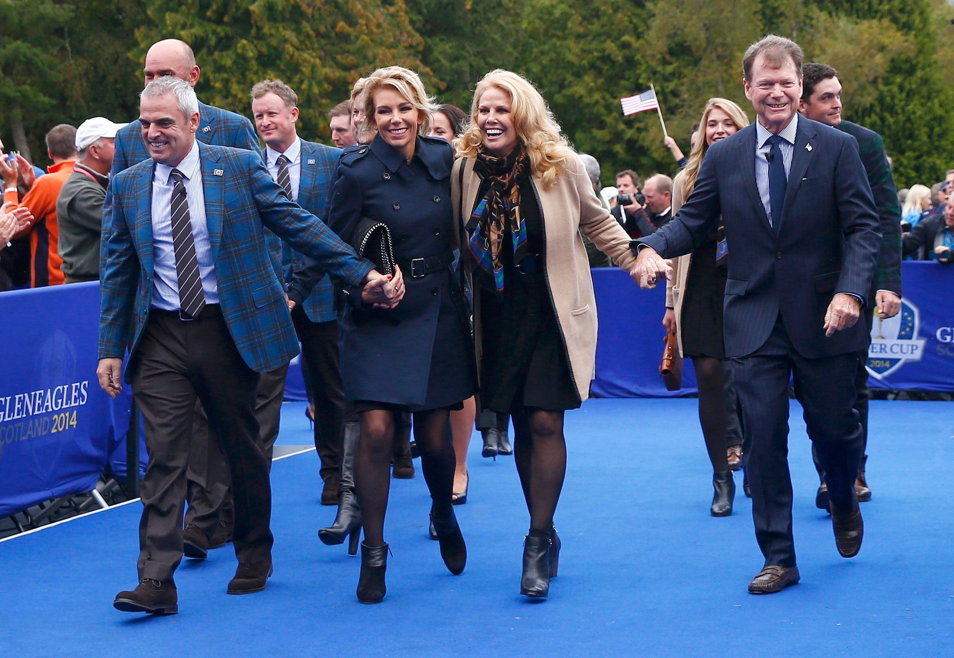 U.S Team captain Tom Watson and his wife Heather and their Team Europe counterparts Paul McGinley and his wife Alison leave the opening ceremony of the 40th Ryder Cup at Gleneagles