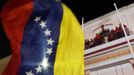 Venezuelan President Hugo Chavez celebrates from a balcony at Miraflores Palace in Caracas October 7, 2012. Chavez won re-election in Sunday's vote with 54 percent of the ballot to beat opposition challenger Henrique Capriles. REUTERS/Tomas Bravo (VENEZUELA - Tags: POLITICS ELECTIONS) Published: Říj. 8, 2012, 5:36 dop.