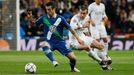 Real Madrid's Gareth Bale in action with Wolfsburg's Vieirinha