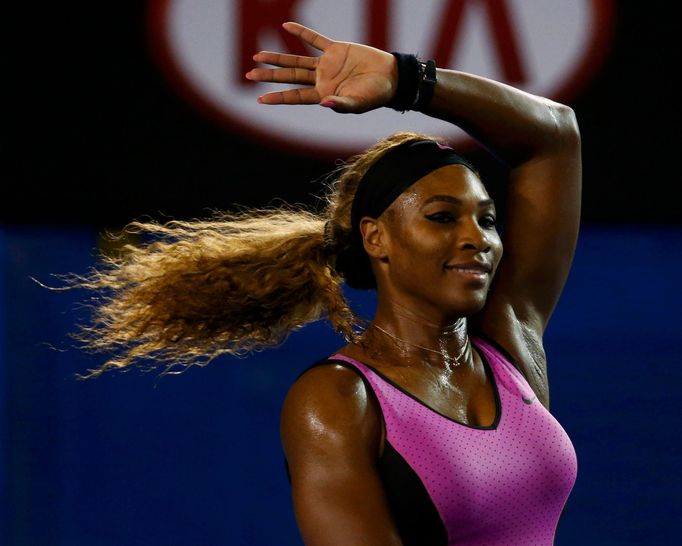 Serena Williams of the United States celebrates defeating Ashleigh Barty of Australia in their women's singles match at the Australian Open 2014 tennis tournament in Melb