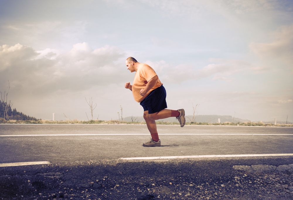 Obezita tlustý muž jogging ilustrační foto