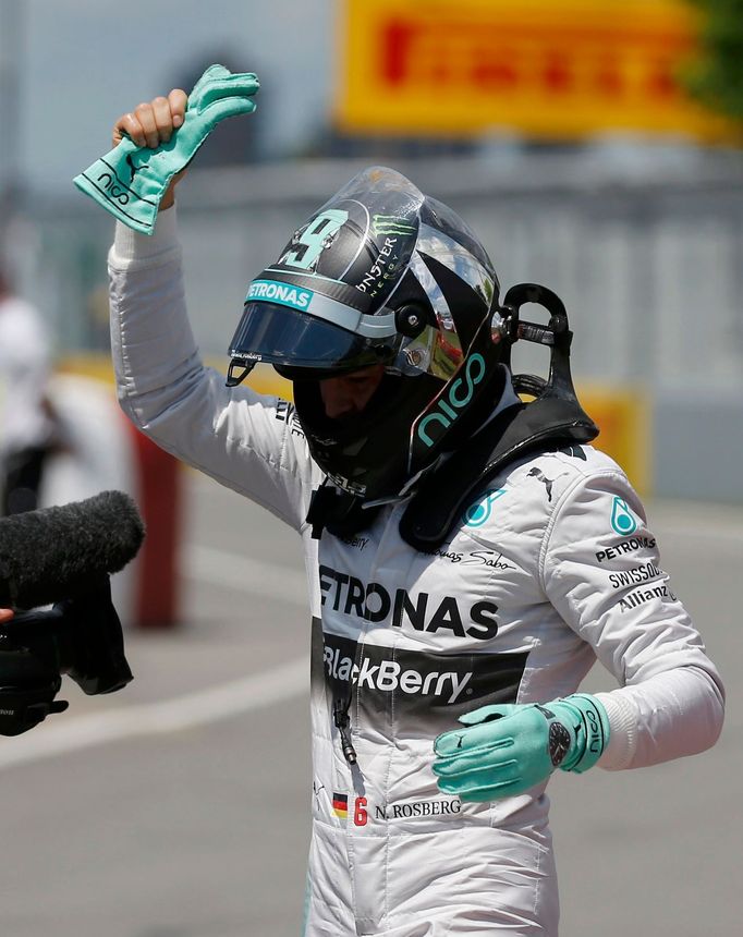 Mercedes Formula One driver Nico Rosberg of Germany celebrates after winning the pole position during the qualifying session of the Canadian F1 Grand Prix at the Circuit