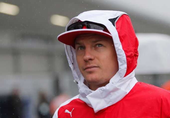 Ferrari's formula one driver Kimi Raikkonen of Finland arrives for the Japanese F1 Grand Prix at the Suzuka Circuit October 5, 2014. REUTERS/Yuya Shino (JAPAN - Tags: SPO